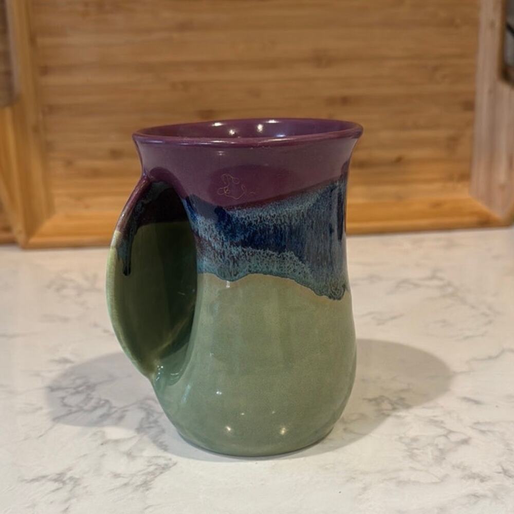 Clay In Motion Neher Pottery Left Handed Hand Warmer Mug Signed
2012 rustic